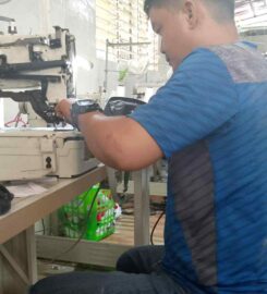 Sewing Machine Repair by Michael Omandac