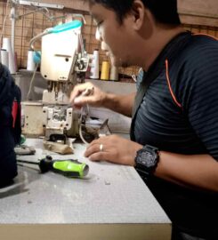 Sewing Machine Repair by Michael Omandac